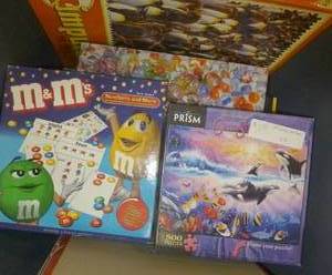 lot G68 image: Tote full of puzzles
