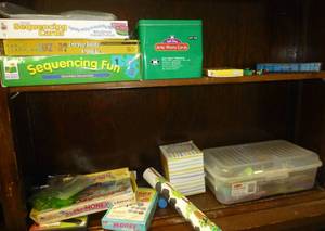 lot C6 image: Contents of One Section of shelves - games, puzzles, phonics