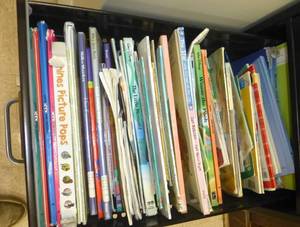 lot C11 image: File cabinet full of books etc