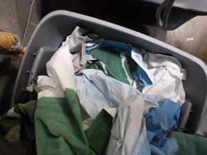 lot E24 image: tote full of stage backdrops