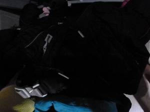 lot E43 image: Tote of girls winter coats and ski pants
