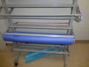 lot O40 image: Paper roll stand and contents