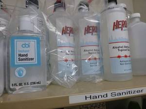 lot O57 image: Hand sanitizer, alcohol, 5 boxes of cold compress