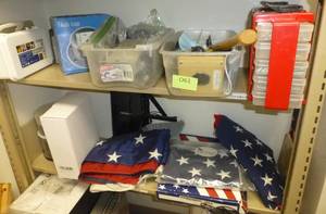 lot O61 image: 2 shelves of tools, flags, etc