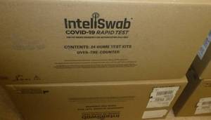 lot O11 image: 2 cases of Inteliswab covid tests each case has 24 tests