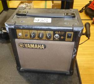 lot G110 image: Audio visual cart with a microphone and portable speaker