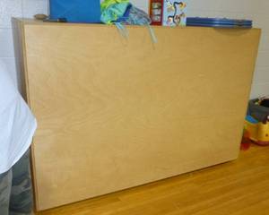 lot G135 image: Large storage shelf unit on wheels with the contents