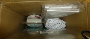 lot O64 image: Misc supplies, paint pan and roller, smoke detector, hand wipes, clipboard