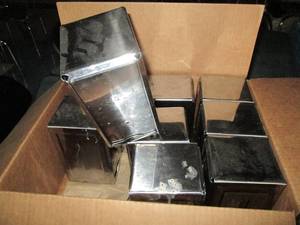 lot C310 image: Box of metal napkin dispensers