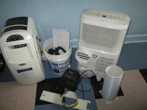 lot C312 image: 2 Portable air conditioners with some accessory parts, sold as pictured