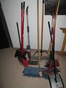 lot O157 image: Lot of brooms, mops and other long handled items