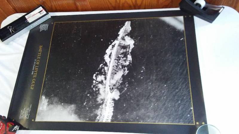 lot 780 image: World War II 50 th Anniversary Commemorative  Posters (3). and  Vintage Photos (10)