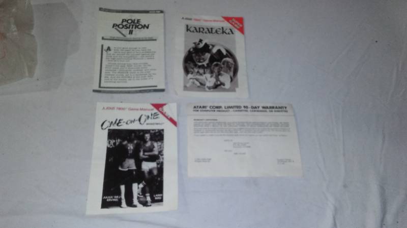 lot 778 image: Atari 1987 Warranty Card And Game Manuals.