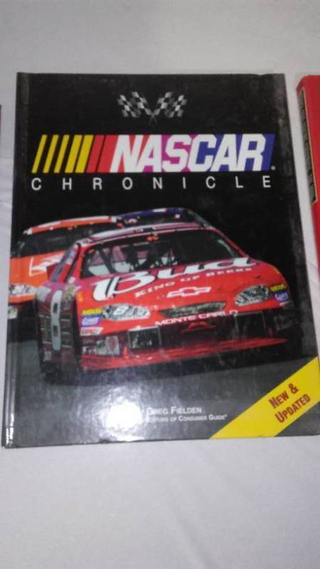 lot 803 image: NASCAR Books, Duck Dynasty, Swim Suit Calendars, Railways and More. (21)