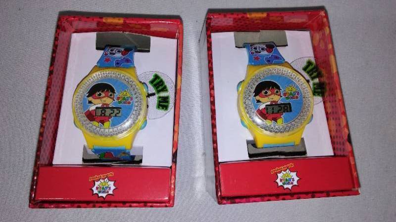lot 734 image: Ryans World Wrist Watch (2) and Pixar No Show Socks. 