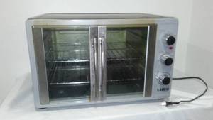 lot 849 image: LUBY Large Toaster Oven Countertop, French Door Design.
