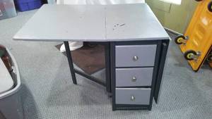 lot 857 image: Wood Folding Table with 6 Drawers.