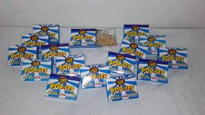 lot 859 image: TNT POP-ITS Pop Pop Party Snaps Trick Noise Maker (15 boxes.)