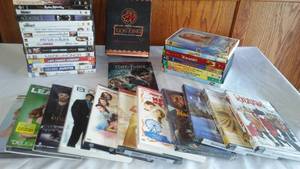 lot 888 image: DVD.  Many New in Shrink Wrap.