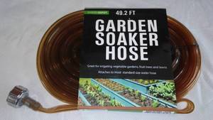 lot 912 image: 49 ft. Foldable Garden Soaker Hose  New.