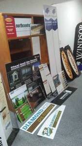 lot 943 image: Home Improvement Signs.