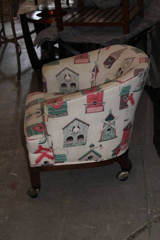Upholstered Club Chair on wheels