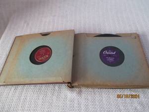 lot 14 image: Vintage Record Album with Multiple Vinyl Records