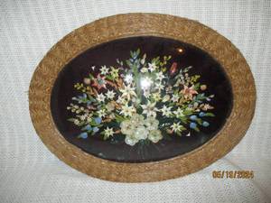 lot 49 image: Vintage Floral Wall Hanging with Oval Woven Frame