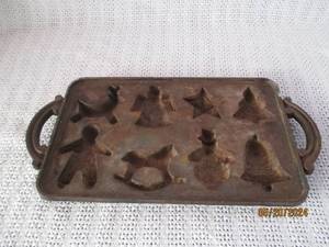 lot 73 image: Vintage Cast Iron Cookie Molds - Set of 2