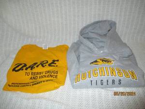 lot 133 image: Lot of D.A.R.E. T-Shirt and Hutchinson Tigers Hoodie
