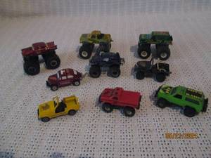 lot 165 image: Lot of Vintage Die-Cast Toy Monster Trucks and Vehicles