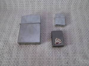 lot 320 image: 2 Zippo lighters and a giant Zippo