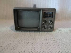 lot 344 image: Portable television - runs on D batteries, no power cord