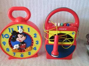 lot 238 image: Disney Mickey Mouse Clock and First Sony Toy Microphone Set