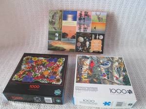 lot 299 image: Set of 3 1000-Piece Puzzles - Nature and Floral Themes