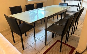 lot 3 image: Contemporary Style Glass Top Table with Hidden Leaf and 8 Chairs