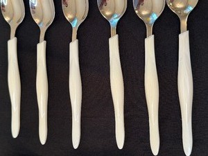 lot 15 image: CUTCO Flatware Items