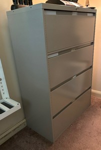 lot 139 image: Four Drawer Metal File Cabinet
