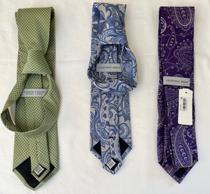 lot 84 image: Grouping of 3 Vibrant Geoffrey Beene Ties