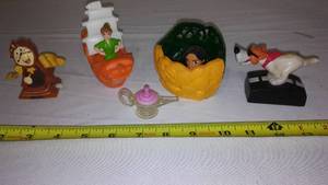 lot 310 image: Disney Promotions. Pocahontas, Peter Pan, Aladdin Lamp,