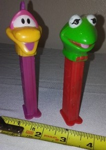 lot 311 image: Pez Dispensers. Dino and Kermit, the Frog. Working condition.