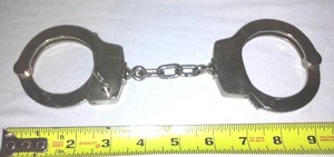 lot 396 image: Authentic Working Handcuffs. Heavy Gauge With Key.