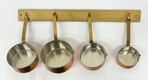 lot 98 image: Beautiful Brass and Copper Measuring Cups and Spoons with Display Rack