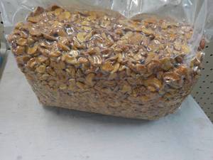 lot 354 image: 12 12 lb. Bag Honey Roasted Cashews Halves and Pieces
