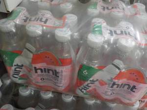 lot 374 image: 24 pack Hint Water Infused with Watermelon Essence 16 oz bottles