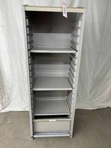 lot 12 image: MSRP $3000 Herman Miller Milcare Storage Cabinet With Roll Up Door Front Comes With 1 Drawer & A Couple Shelves - Great Condition  - 67 x 23 x 18 - In Great Condition