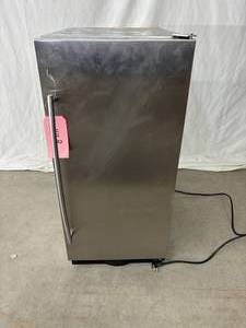 lot 18 image: MSRP $3000 U-Line&nbsp3.1 Cu. Ft. Outdoor Rated Stainless Steel Solid Door Under Counter Refrigerator For Your Patio or Deck -&nbspExcellent Working Condition