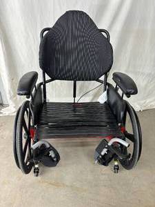 lot 26 image: MSRP $4000 Broda 48V4 Encore Pedal Tilting Wheelchair 24 Width  - Weight Capacity 350 lbs. - Excellent Working Condition