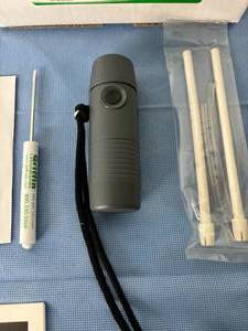 lot 74 image: MSRP $1400 Griffin Laboratories SolaTone Electronic&nbspTruTone Plus Electrolarynx&nbspSpeech Aid with Instructional DVD & More  Appears New In Open Box
