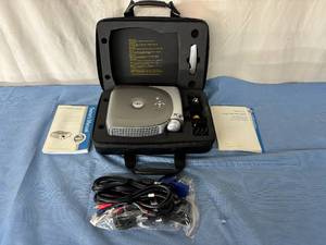 lot 8 image: Dell 1100MP Projector with Video Audio Cords, Manual, and Carry Bag - In Excellent Working Condition